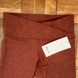 Always On HR tight 28” in a burnt orange color